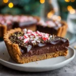 Christmas Chocolate Biscoff Tart (No-Bake Holiday Magic!) 3 Christmas Chocolate Biscoff Tart on holiday table with gold decorations